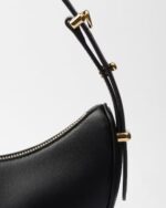 Prada Arqué small leather shoulder bag